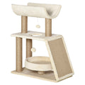 A multi-level cat tree with a cream-colored plush hammock, jute-wrapped scratching posts, a scratching panel, a circular cat bed, and dangling toy balls