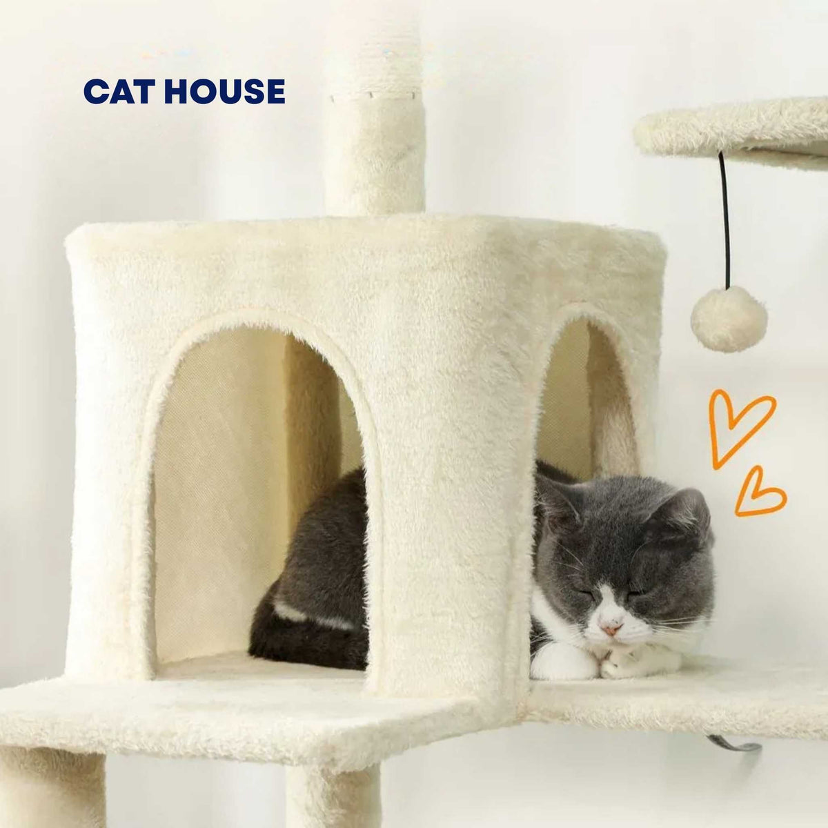 Beige cat house on large cat tree