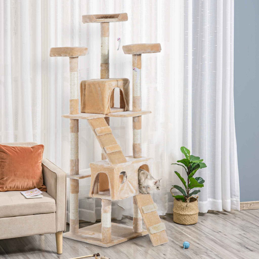 Beige cat tree in living room with cat house