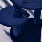 Blue plush fabric platforms on cat tree