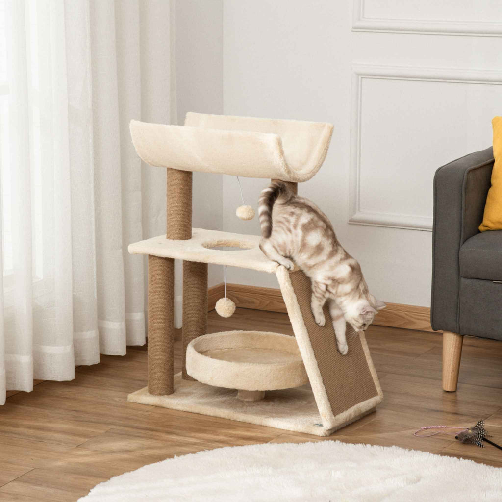 Cat climbing a multi-level cat tree in a living room