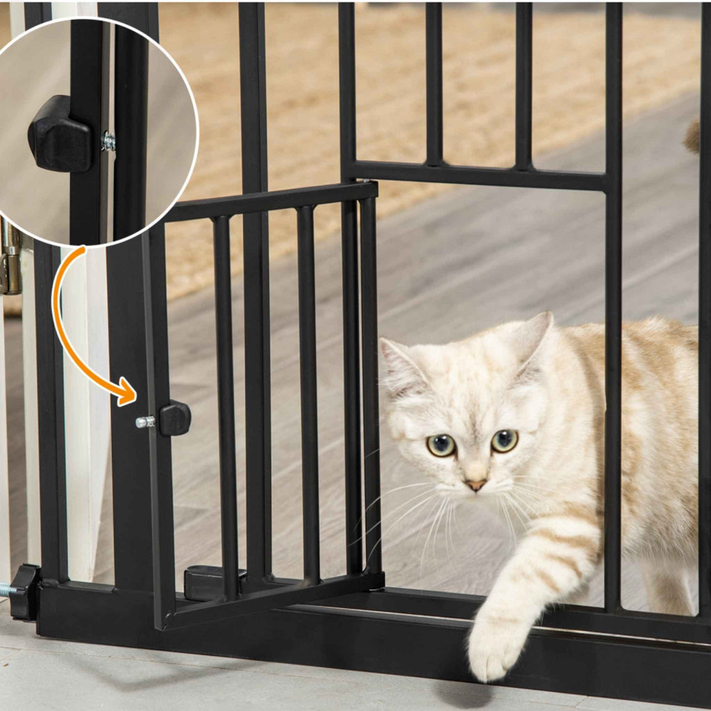 Cat friendly gate within black dog barrier