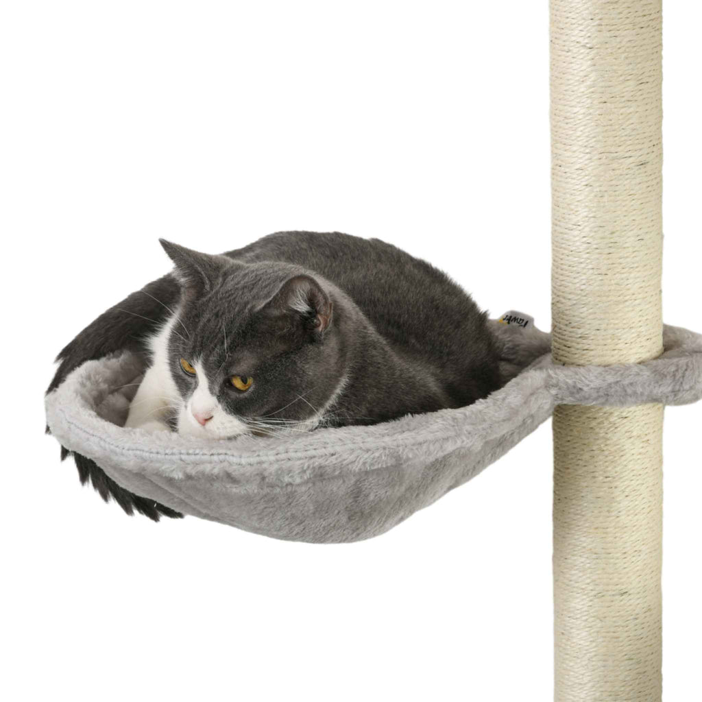 Cat laying in cat tree bed
