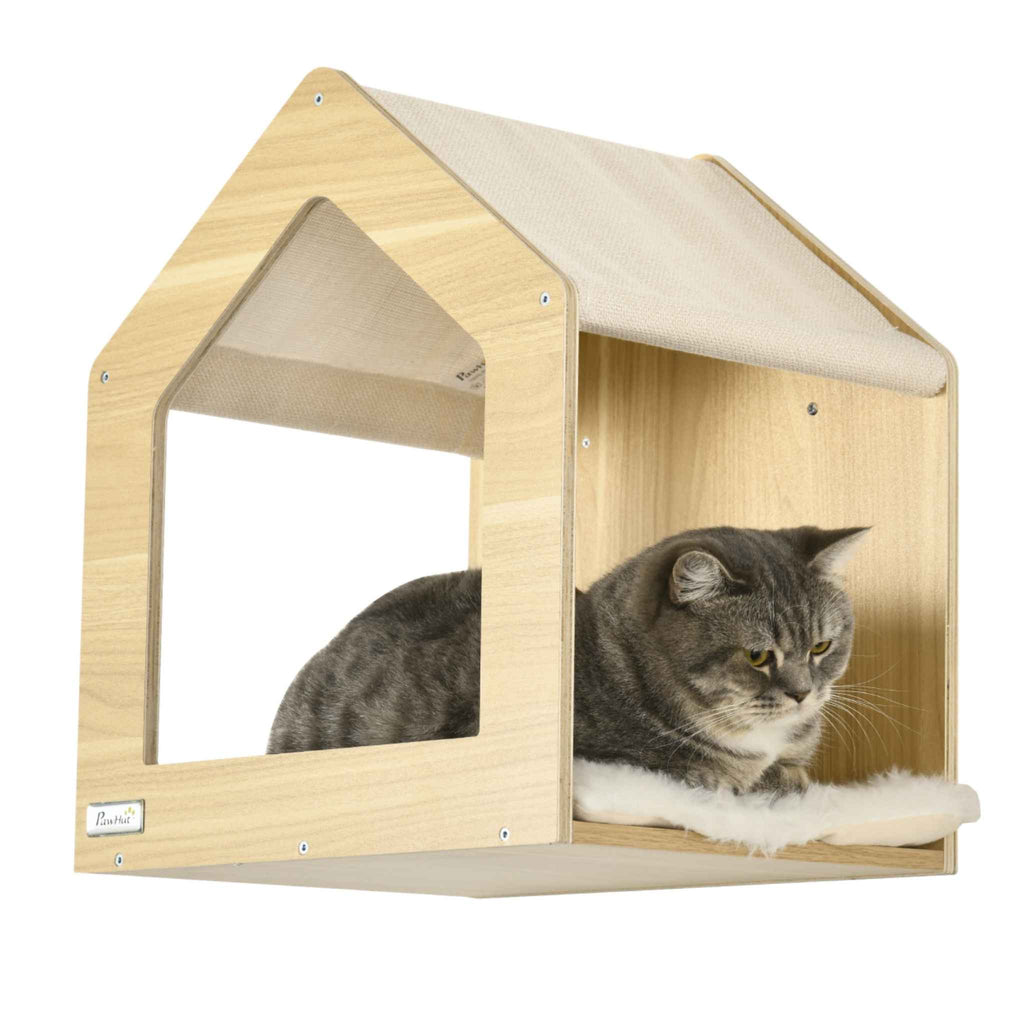 Cat laying in wood effect cat house
