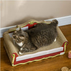 Cat laying on cardboard sofa scratcher in living room