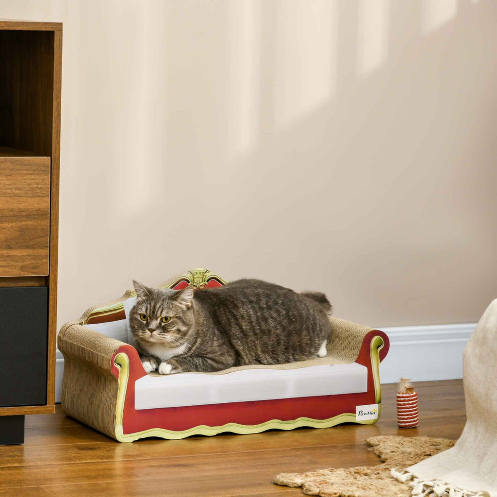 Cat laying on cardboard sofa scratcher