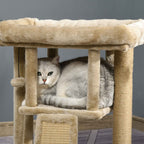 Cat laying on second level of beige cat tree