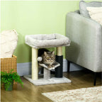 Cat laying on small cat tree perch in living room