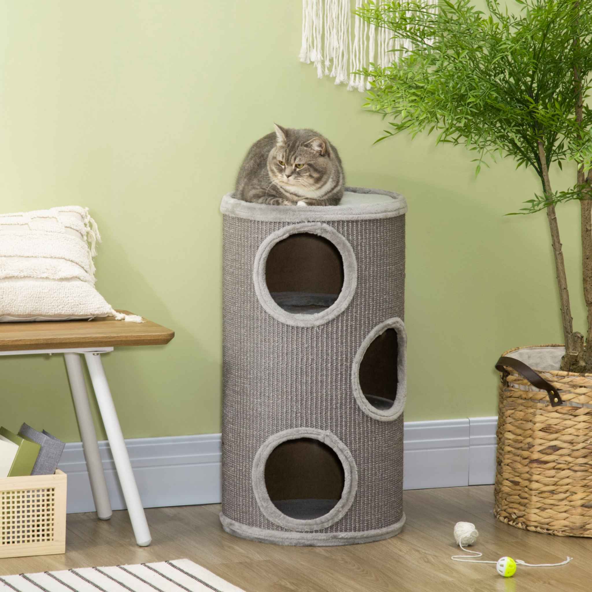 Cat laying on top perch of 70cm tall scratching barrel