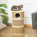 Cat laying on top perch of barrel