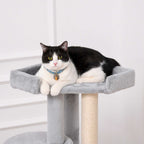 Cat laying on top perch of grey cat tree