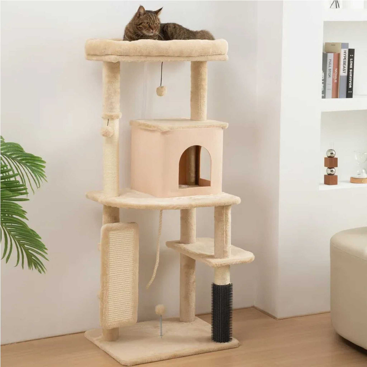 Cat resting on top perch of beige cat tree