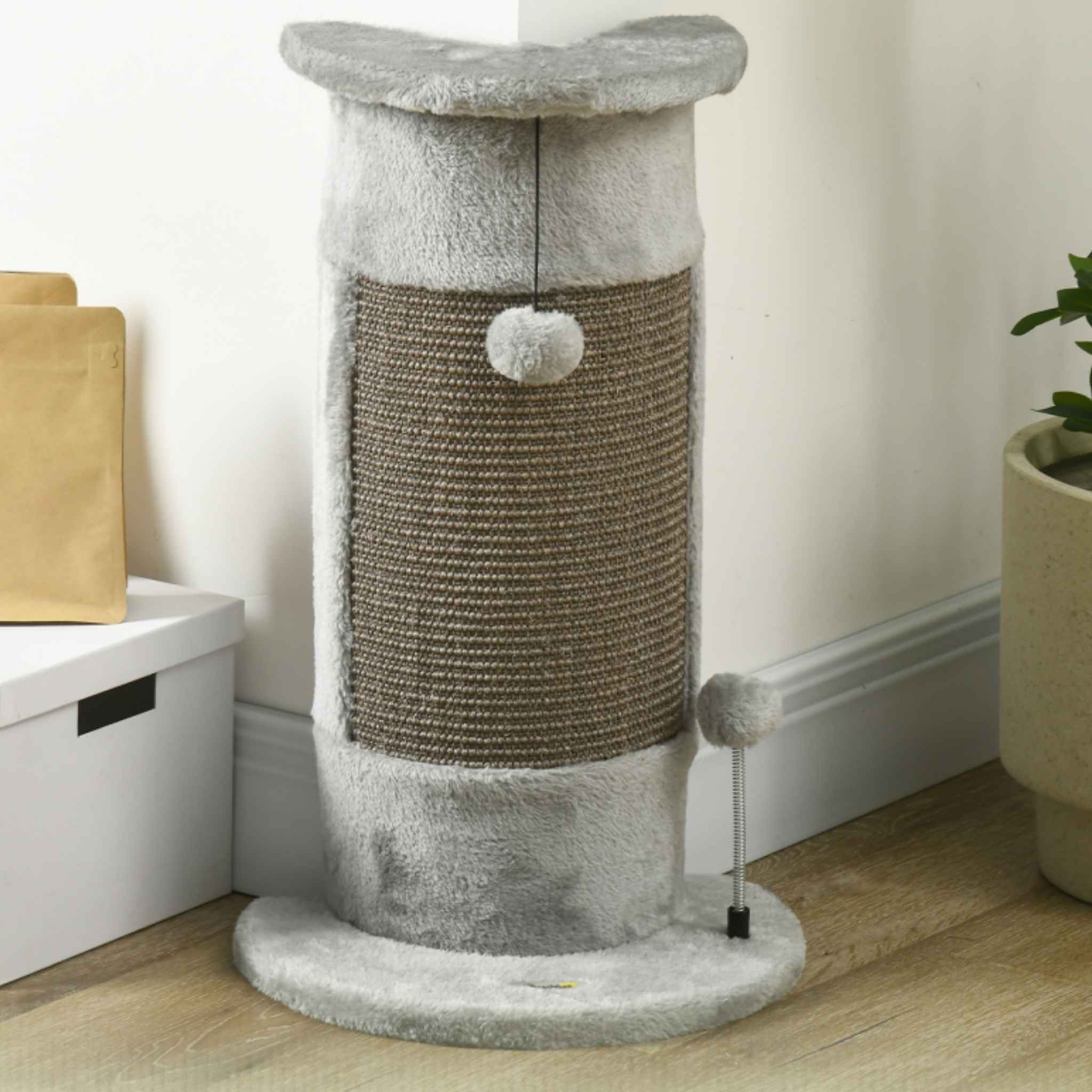 Cat scratching post positioned at corner of a wall