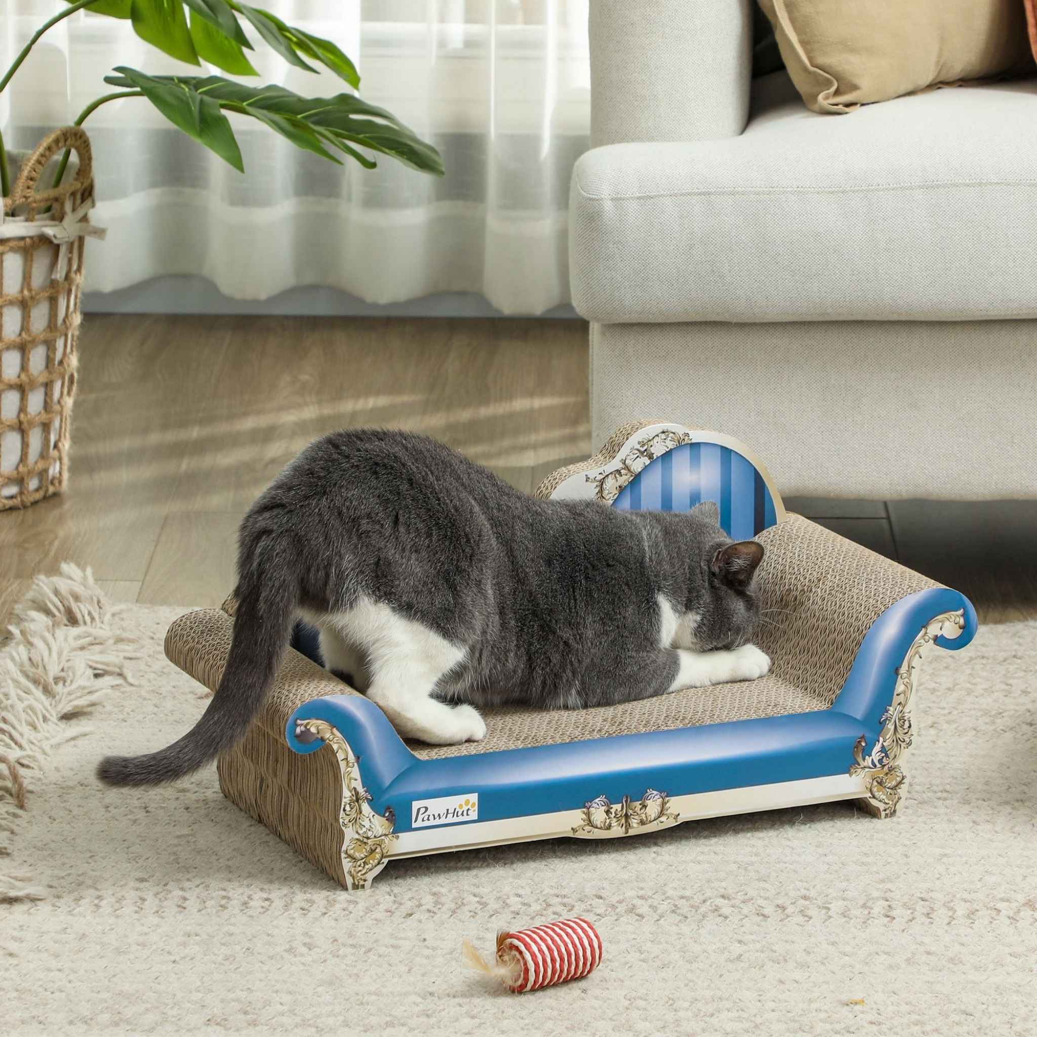 Cat scratching sofa style scratcher