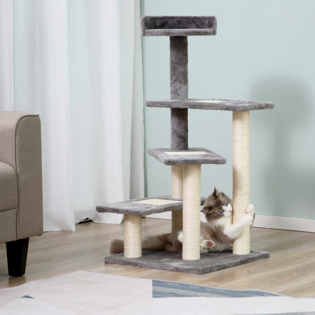 Cat scratching tall grey cat tree