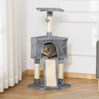 Cat sitting in house on grey cat scratching tower