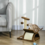 Cat sitting on small cat tree next to a sofa