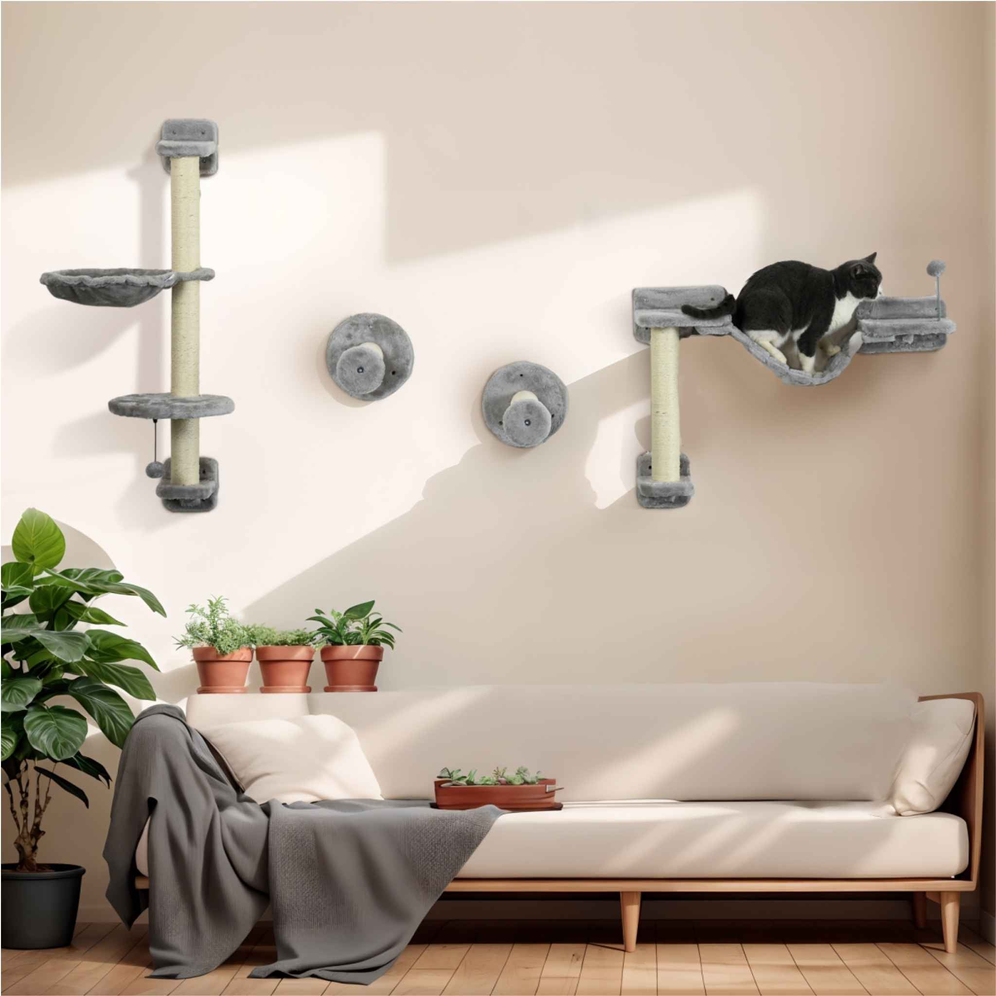 Cat sitting on wall mounted tree in living room