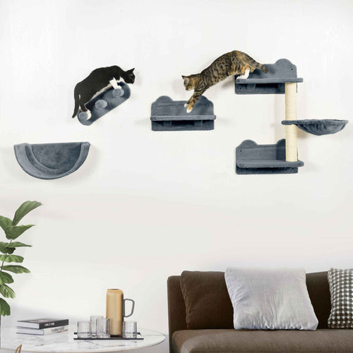 Cats playing on wall mounted sisal rope scratcher