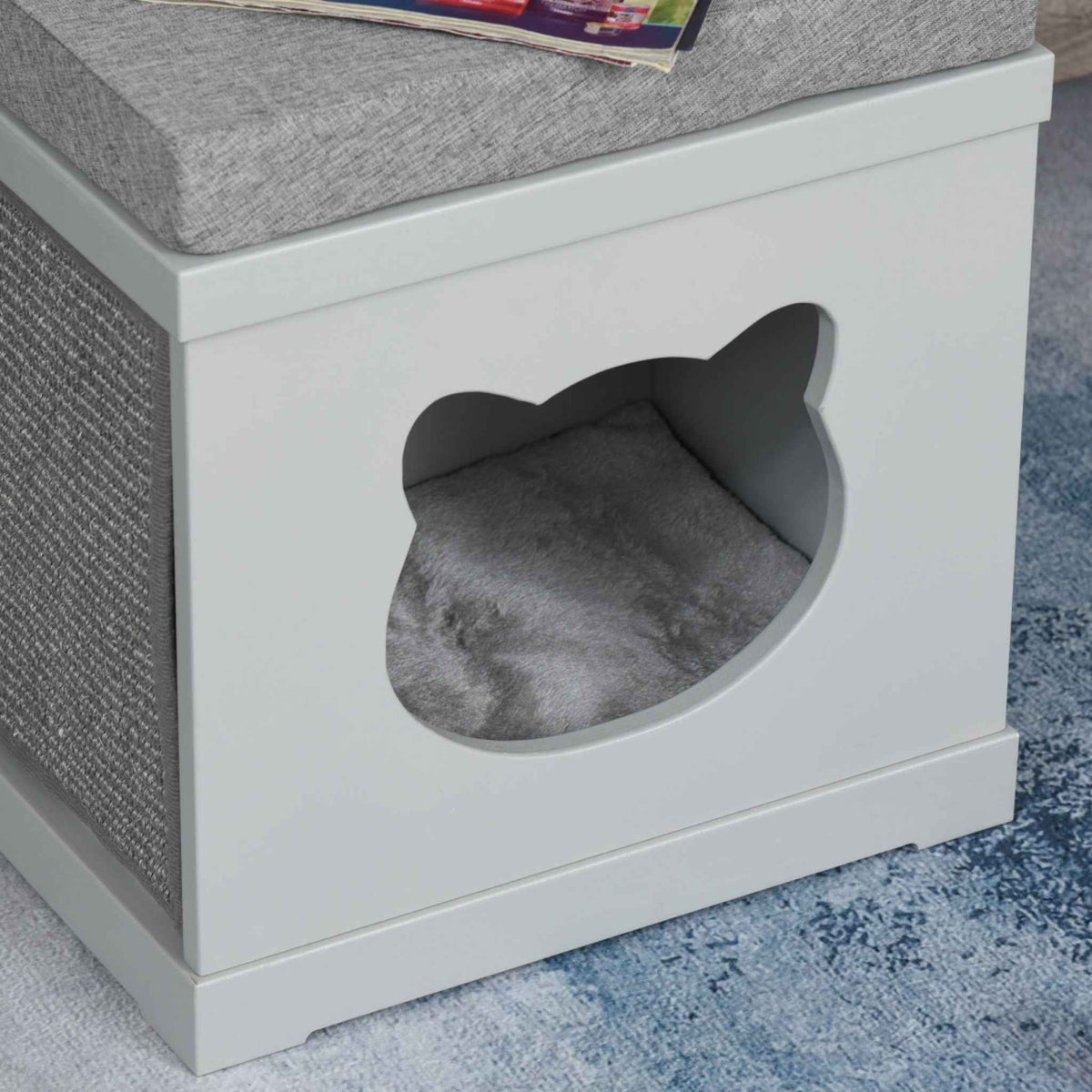 Comfortable grey cushion in wooden cat cave