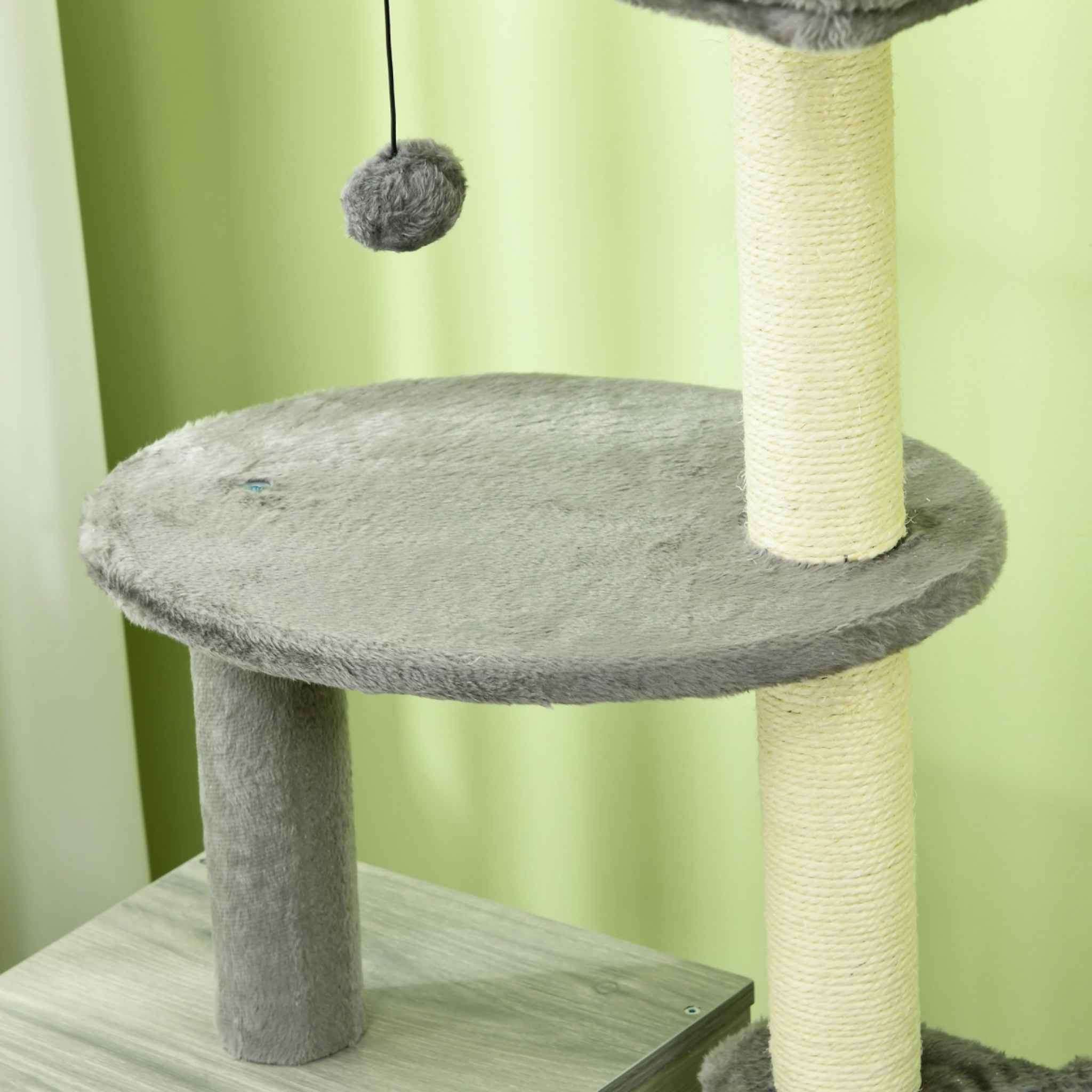 Dangling toy and grey plush fabric platform