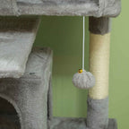 Cat tree with a dangling toy