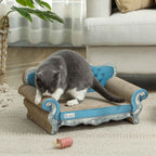 Grey cat scratching corrugated cardboard