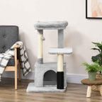 Grey fabric multi level cat tree in living room
