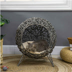 Grey wicker cat bed in living room