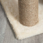 Jute rope scratching post on cream cat tree