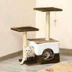 Kitten climbing through multi level brown cat scratcher
