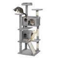 A tall grey cat tree with multiple platforms, a scratching post, a small enclosed house, and a ramp, with three cats on it
