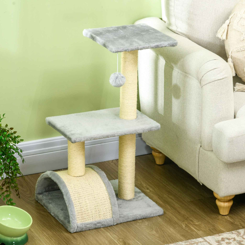 Light grey multi-level cat tree in living room