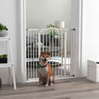 Medium size dog in front of tall white metal safety barrier