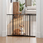 Medium sized dog sitting behind wide black pet gate