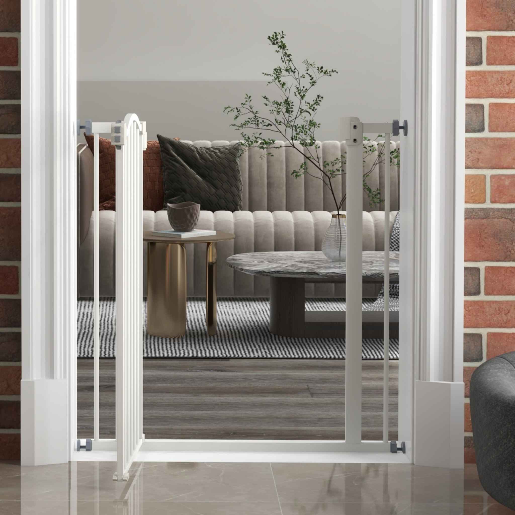 Narrow white dog gate in doorway