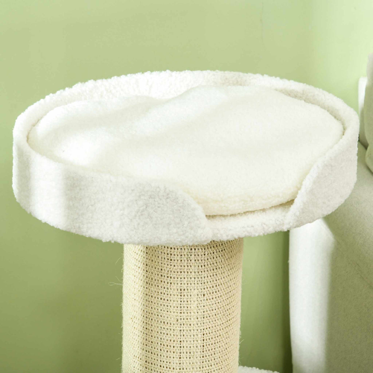 Plush cream top perch of cat tower