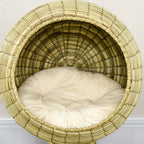 Plush cushion in raised feline bed