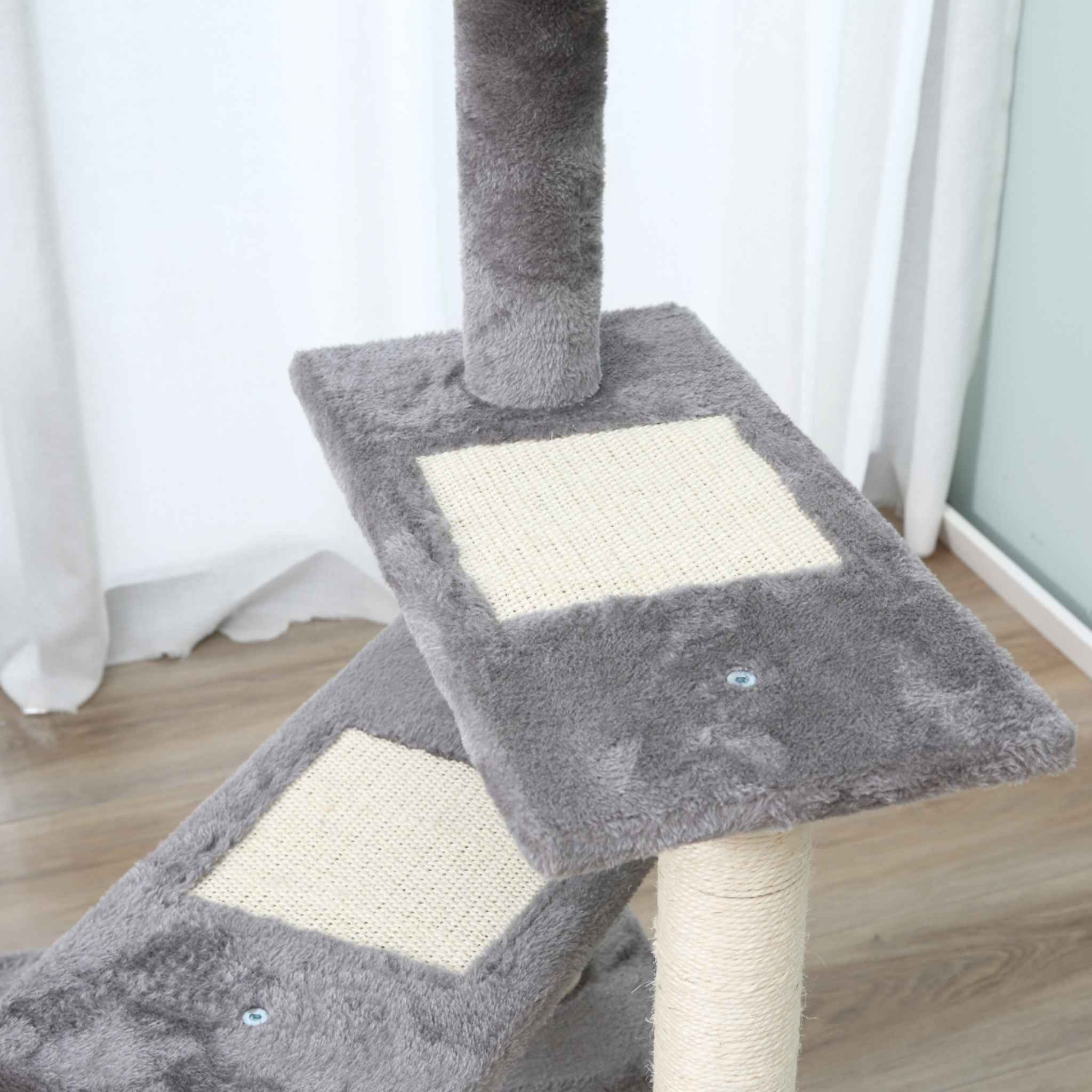 Sisal scratching area on tall grey cat tower