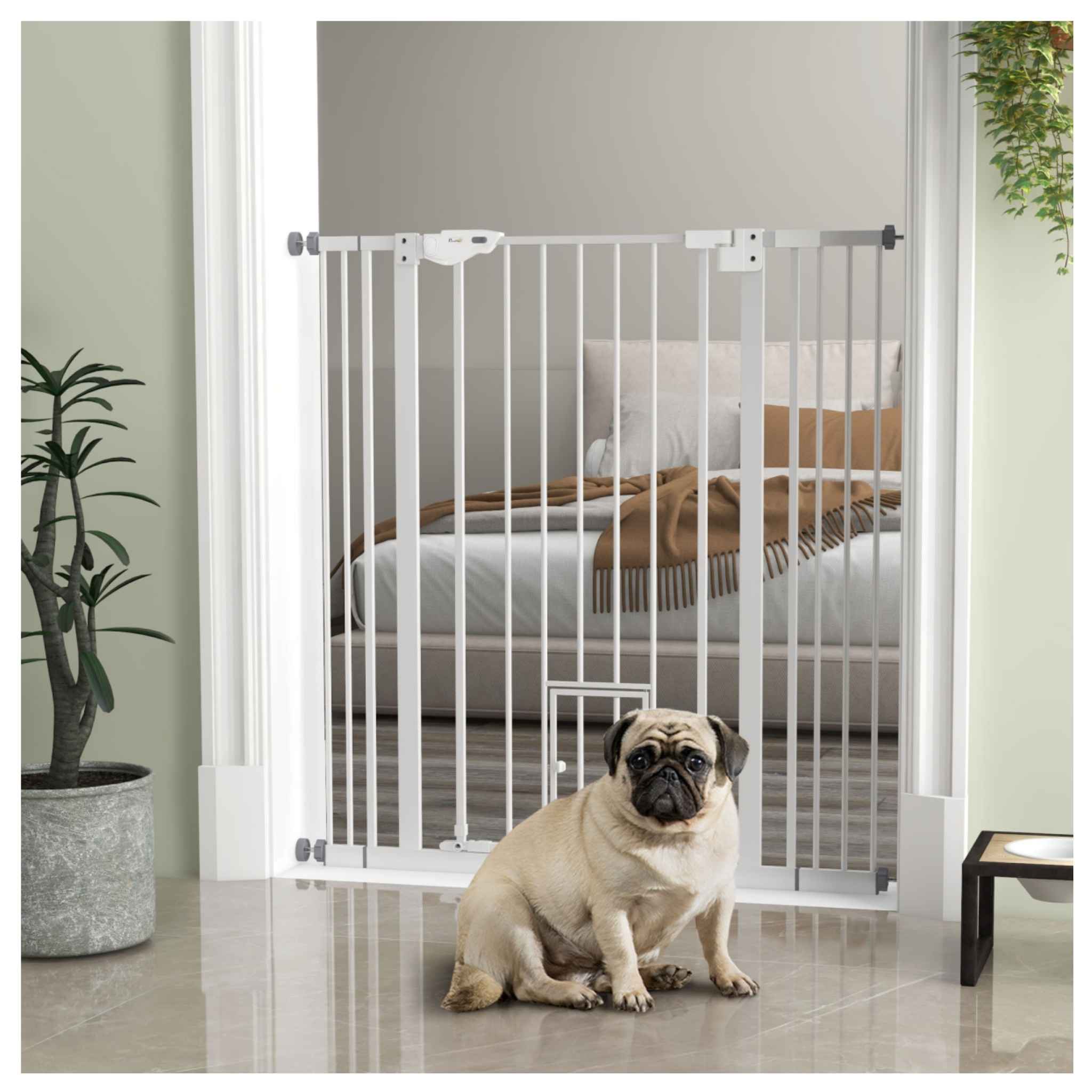 Small dog sitting in front of tall white dog gate