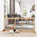 Small dog sitting in front of wooden safety barrier in living room