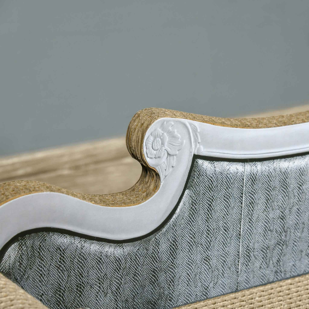 Sofa backrest on cardboard scratcher