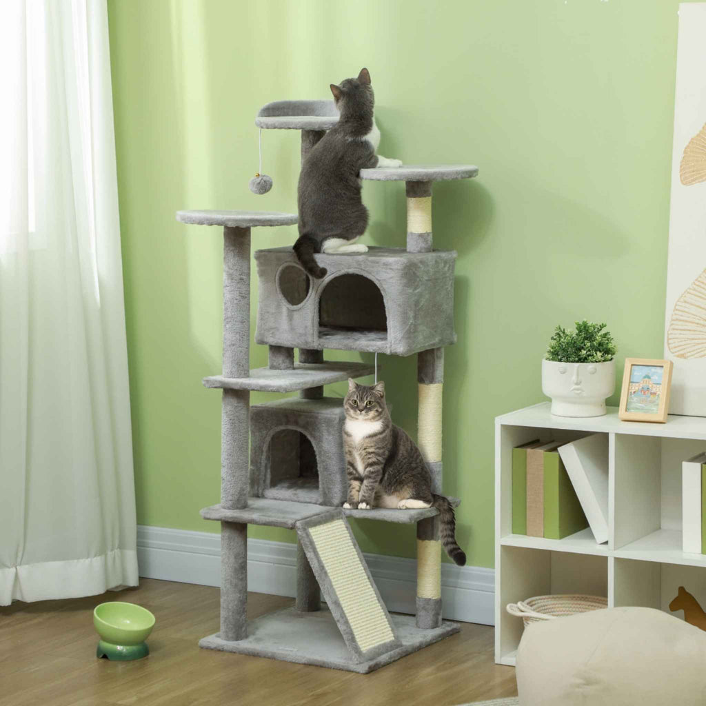 Large grey cat tree with two cats in a living room