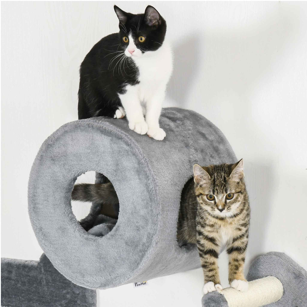 A grey plush cat house with two cats