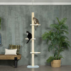 Two cats sitting on cream 260cm tall floor to ceiling cat tree