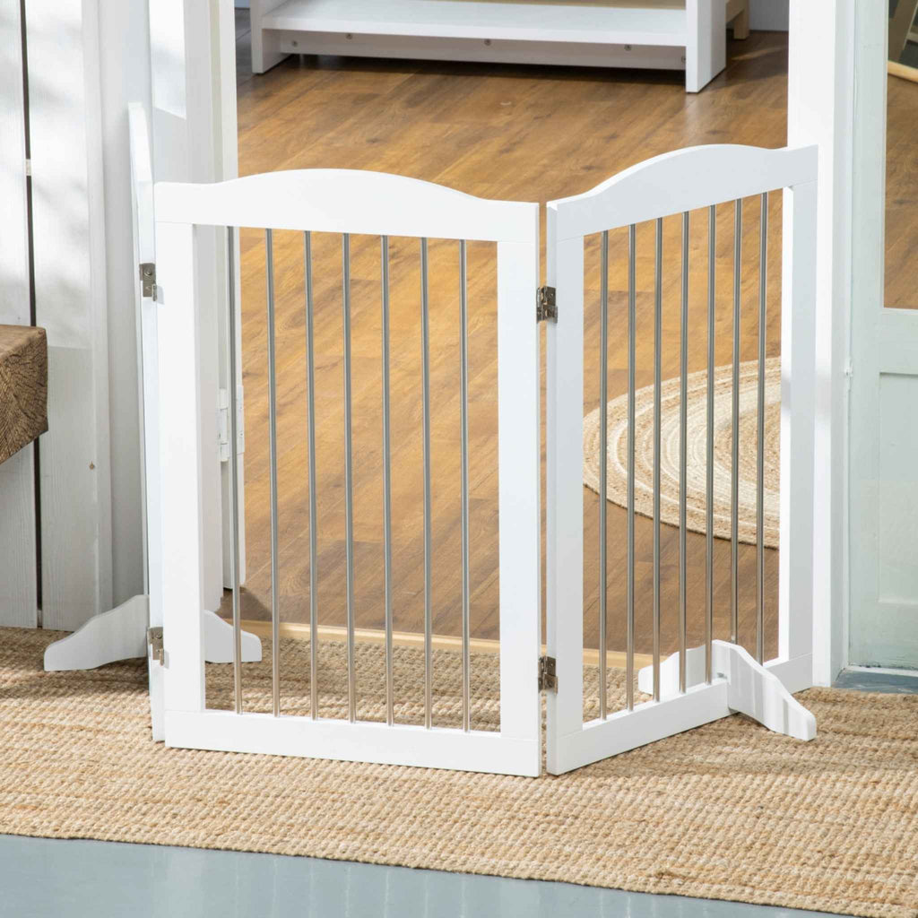 White freestanding pet gate in hallway