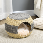 Wicker cat bed on floor of living room